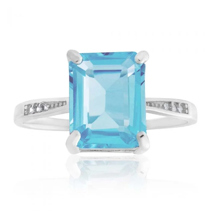 Sterling Silver Blue Topaz Ring with Zirconia Accent